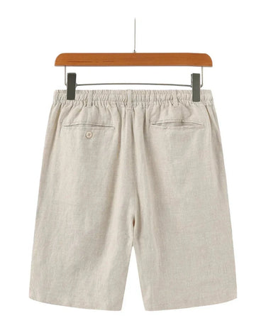 Pantalón corto de lino beige en percha, vista trasera
