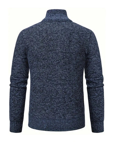Marineblå meleret sweater med lynlås og høj hals, set bagfra
