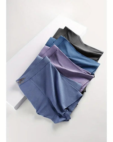 Herren Boxershorts aus Baumwolle, einfarbig – die 4 Boxershorts ausgebreitet, gemischte Farben