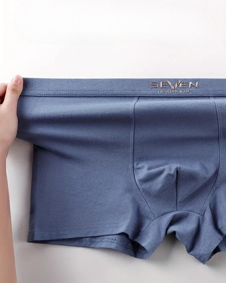 Boxer uomo in cotone tinta unita – il boxer allargato con le mani, interno