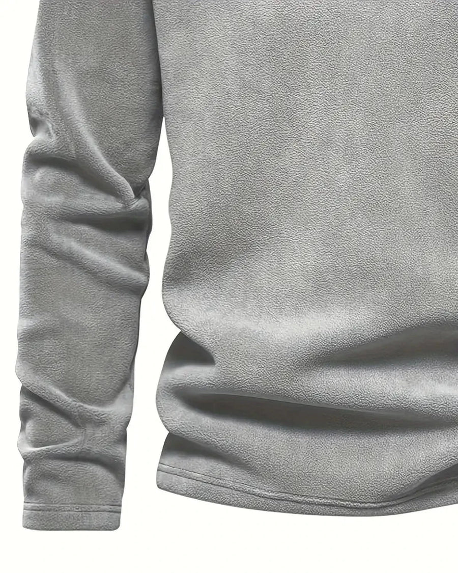 Jersey polar gris, detalle de la manga y el bajo