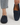 Mocassins de conduite bleu marine portés, semelle intérieure en cuir visible