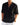 Camicia di lino nera con scollo a V e maniche arrotolate, indossata