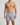 Løse herreboxershorts i bomuld med tern og print – båret, set forfra